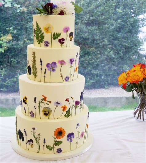 Pressed Flower Wedding Cake | Wedding cake edible flowers, Wedding cakes with flowers, Wedding ...