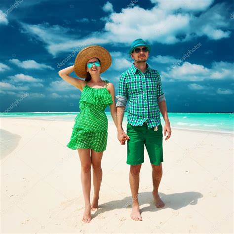 Couple on beach at Maldives Stock Photo by ©haveseen 62360173