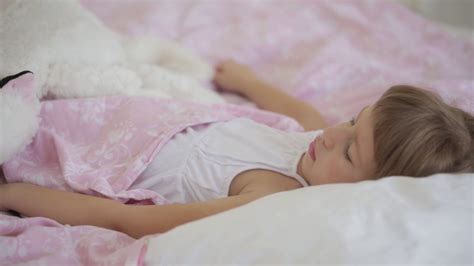 Child Peacefully Sleeping With Toy Stock Footage SBV-310035691 - Storyblocks