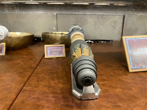 PHOTOS, VIDEO: NEW Rey Legacy Lightsaber Hilt Rises in Star Wars: Galaxy's Edge at Disneyland ...