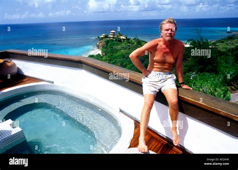 Sir Richard Branson sitting on the Main House on Necker Island Stock ...