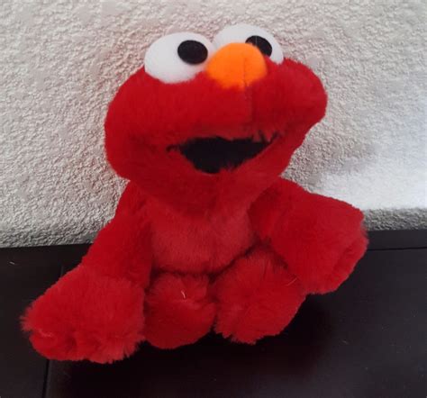 Elmo Peluche Plaza Sesamo 20 Cm - $ 220.00 en Mercado Libre