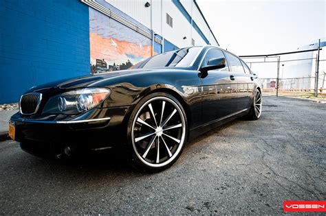 Standard of Elegance: Gloss Black BMW 7-Series Enhanced by Chrome Trim ...