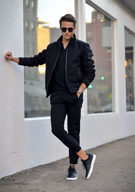 Adam Gallagher Wearing: Express black joggers, wool blend bomber jacket, cotton Henley ...