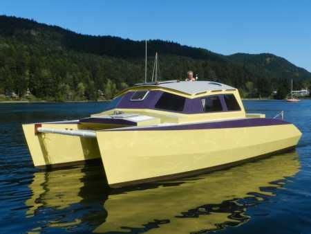 The Skoota 28 is a 28 ft plywood demountable coastal cruising power catamaran for a couple ...