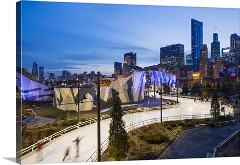 Illinois, Chicago. The Maggie Daley Park Ice Skating Ribbon on a cold Winter's evening Wall Art ...