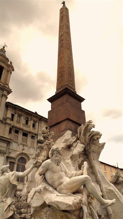 Bernini's Fountain of the Four Rivers. Rome, Italy. The fountain is in the center of the Piazza ...