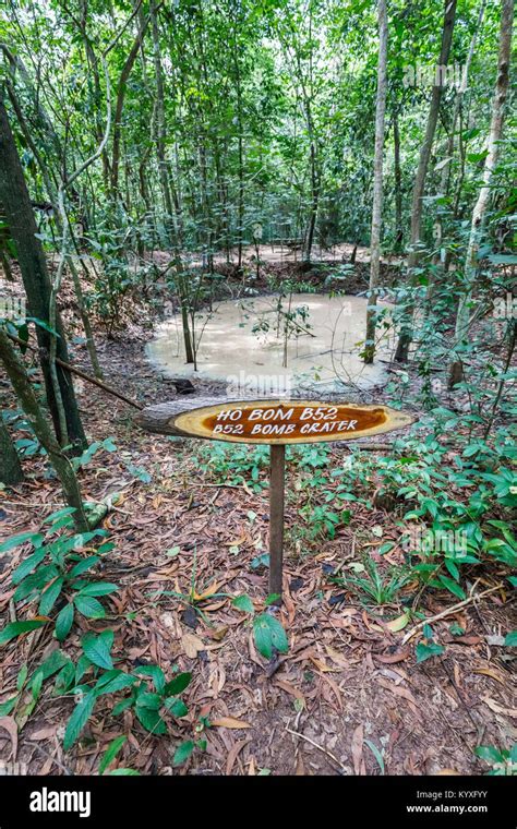 B52 bomb crater at the iconic Cu Chi Tunnel network, hidden Viet Cong tunnels, a leading tourist ...