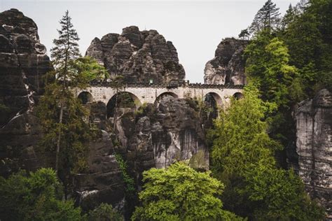 Premium Photo | Sunrise bastei bastei bridge architecture fog sun ...