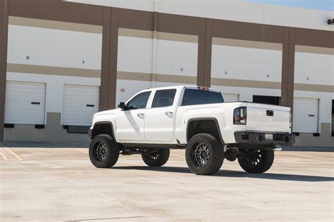 The Higher the Truck, the Closer to God: White Lifted GMC Sierra — CARiD.com Gallery