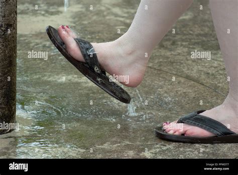 Walking in sandals hi-res stock photography and images - Alamy