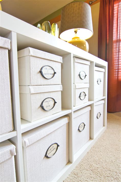 Cubicle shelving from IKEA serves as a sofa table as well as storage ...