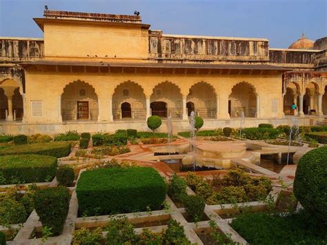 Amer fort is a beautiful palace built from yellow and pink sandstone ...