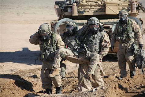 Army's 1st Cav Stresses MOPP Gear as It Resumes Training Amid COVID-19 | Military.com