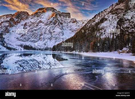 winter sunrise over Lago di Braies, Dolomites, Italy Stock Photo - Alamy