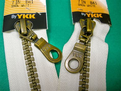 YKK - A&E See What Materializes | Brand, Zip ups, Zipper