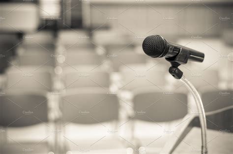 Microphone on the speech podium featuring audience, audio, and ...