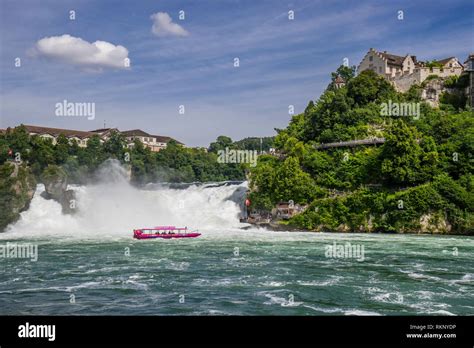 tour boat at the Rhine Falls (Rheinfall), Europe's largest waterfall, cantons of Zürich and ...