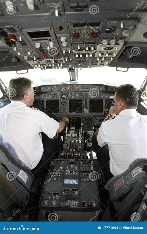 Airplane Pilots in Cockpit Preparing To Takeoff Editorial Stock Image ...