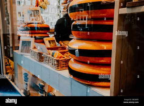 Dutch cheeses fill on a specialist cheese shop. Amsterdam, Netherlands ...