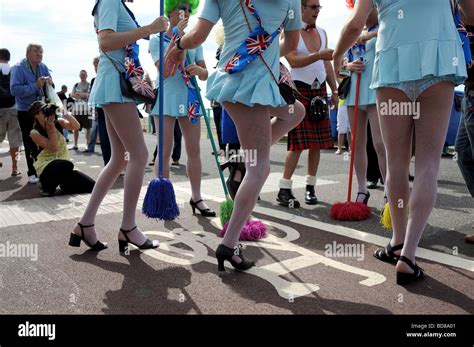 people in costume taking part in this years Brighton Pride procession ...