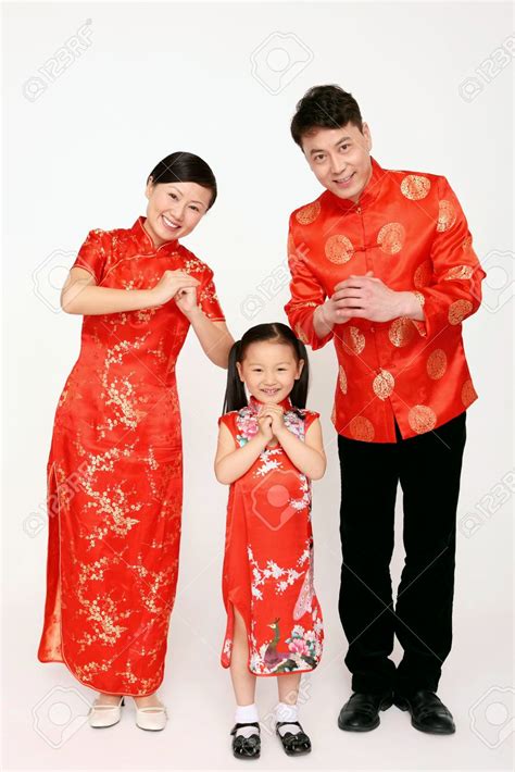 Family in chinese traditional clothing wishing Happy Chinese New Year Stock Photo - 39 ...