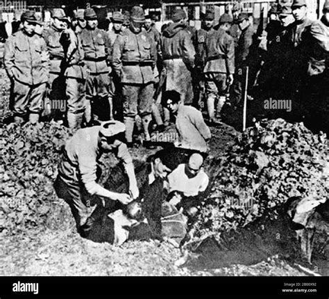 China: Rape of Nanking - Japanese soldiers burying Chinese victims ...