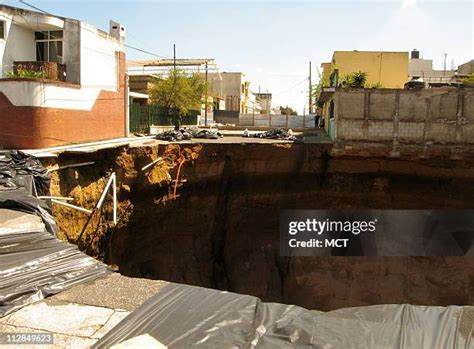 Guatemala Sinkhole Photos and Premium High Res Pictures - Getty Images