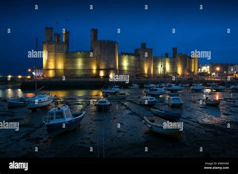 Caernarfon Castle by night Stock Photo - Alamy