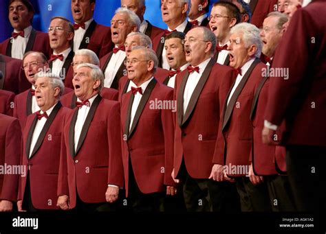 Male voice choir singing on stage at the National Eisteddfod of Wales ...