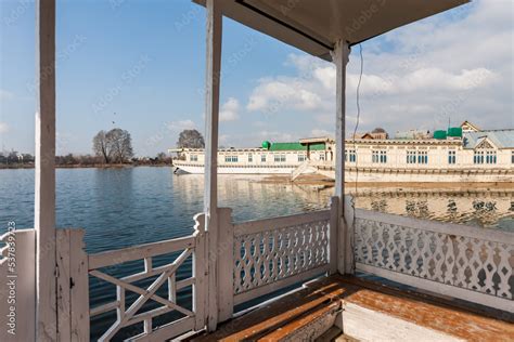 Houseboats on Dal Lake, seen from the deck of another houseboat ...