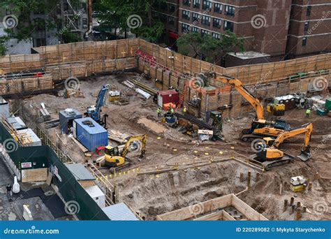 Excavators Digging on Skyscraper Construction Site with Foundation Pit. Stock Photo - Image of ...