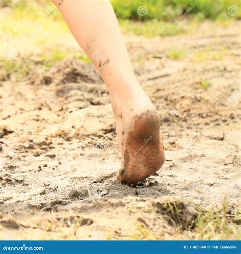 Bare Foot of a Little Girl in Mud Stock Photo - Image of girl, barefeet ...