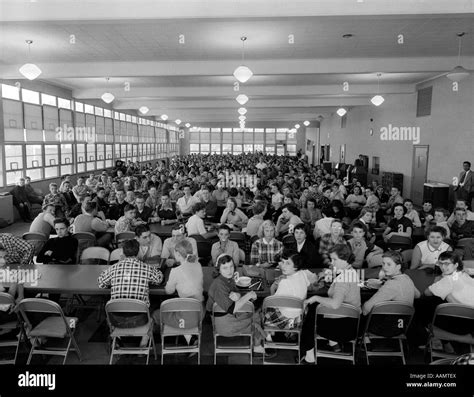 1950s CROWDED HIGH SCHOOL CAFETERIA Stock Photo - Alamy