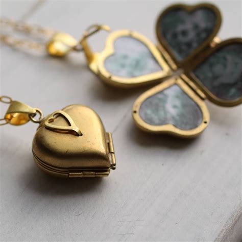 Cute locket that opens to make 4 hearts for pictures of kids or ...