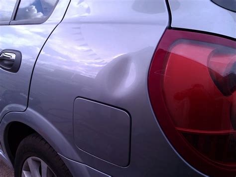 Easy DIY Ways to Take Dents Out of Your Car - AxleAddict