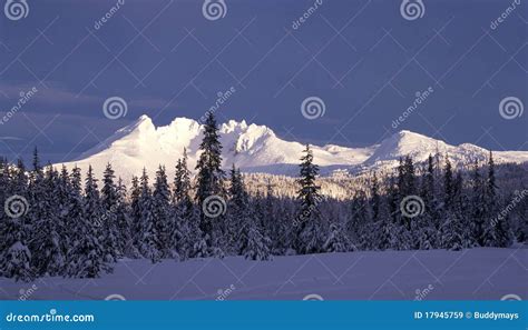 Snowy mountain peaks stock image. Image of area, frigid - 17945759