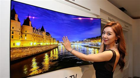 Photos: LG to Unveil Flexible Screen That Can Be Rolled Up Like Paper ...