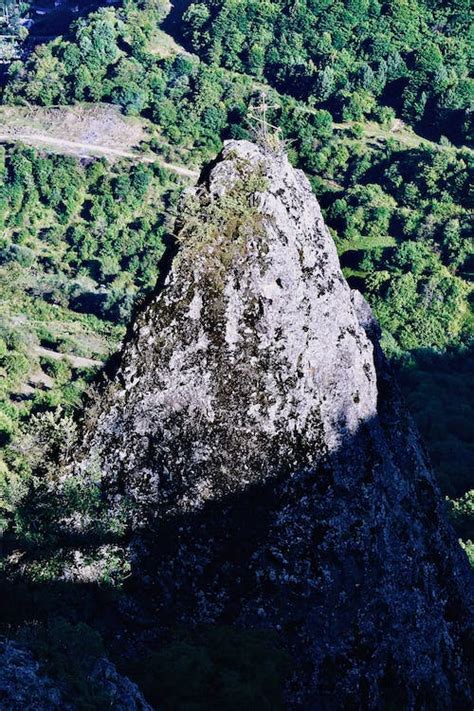 Gray Rock Formation Surrounded by Green Trees · Free Stock Photo