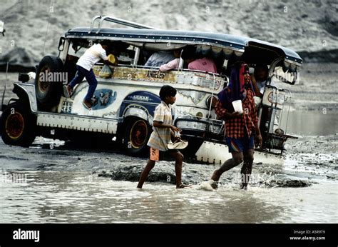 MOUNT PINATUBO AREA PHILIPPINES VOLCANO ERUPTION 1991 CARS DRIVE THRU FLOODED RIVER BAMBAM ...