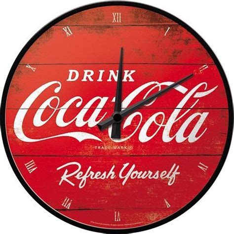 Ronde wandklok Coca Cola. Rode metalen wandklok met Coca Cola 31 cm. Klok is exclusief AA ...