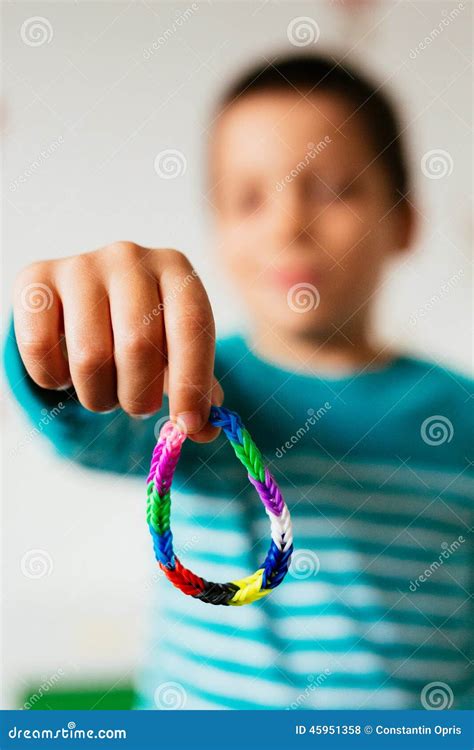 Boy Showing Friendship Bracelet Stock Photo - Image of children, funny: 45951358