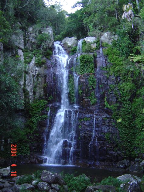 there is a large waterfall in the woods