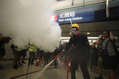 Chaos at Hong Kong’s Yuen Long MTR station as protesters confront ...