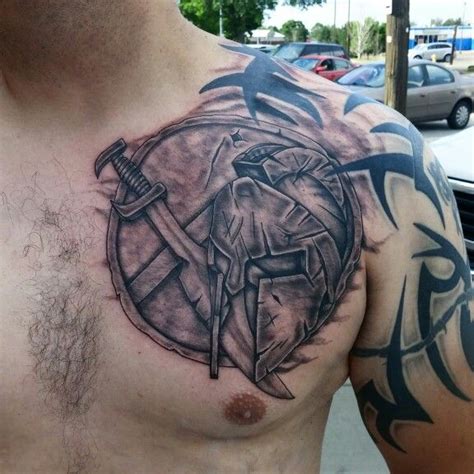 Spartan shield and helmet | Shield tattoo, Tattoos, Tattoo designs