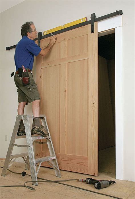 How to Install a Sliding Barn Door - Fine Homebuilding