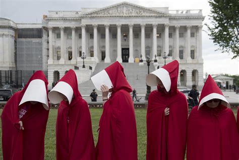 Handmaid's Tale Costumes Used to Protest Health Care Bill | TIME