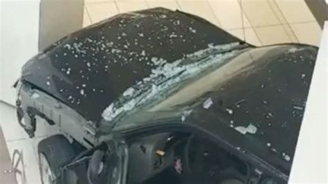 Man charged with terrorism after car driven through Illinois shopping ...