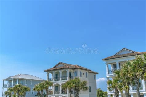 Destin, Florida- Front Exterior of Beach Homes Against the Blue Sky ...