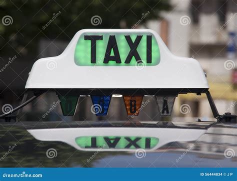 Taxi sign stock photo. Image of traffic, yellow, waiting - 56444834